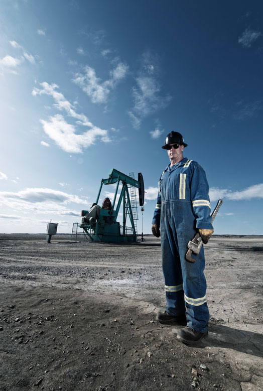 a-man-in-overalls-and-hard-hat-at-a-pump-jack-in-o-2025